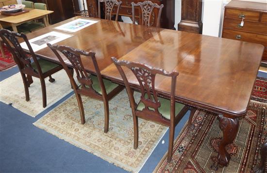 A carved mahogany Chippendale style dining suite, comprising an extending dining table (3 extra leaves), seven chairs and sideboard Tab